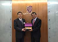 Prof. Rocky Tuan (right), Vice-Chancellor of CUHK, presents a souvenir to Prof. Yang Baofeng